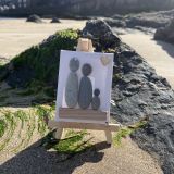 Two Adults And A Child Peble Canvas