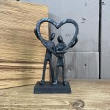 Couple In Heart Sculpture