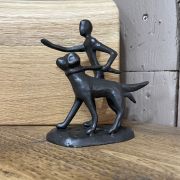 Child And Their Dog Sculpture