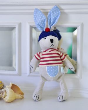 Rabbit Wearing A Striped Top And Hat